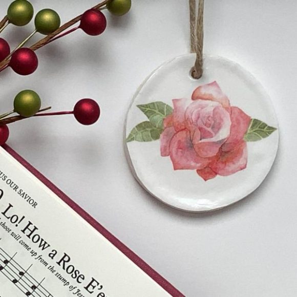 Rose Blooming ornament with hymnal and floral spray