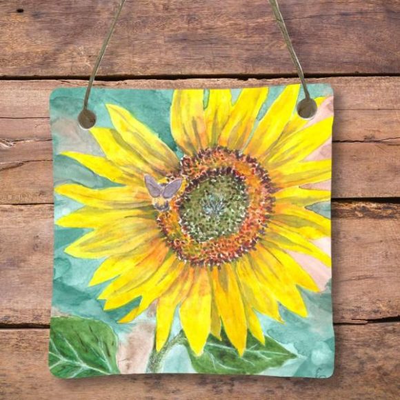 Sunflower Painting Ornament on a wood background