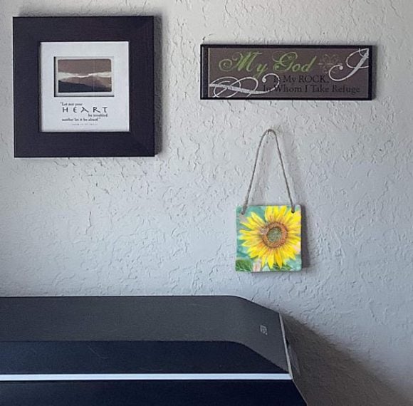 Sunflower Painting Ornament hanging on wall with framed print and plaque