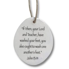 text of John 13:14 printed on white oval ornament