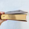 A ESV Wide Margin by Crossway Publishing in Brown. It has a design of The Holy Bible in a Wreath engraved on it. It is hand lettered with calligraphy and makes a beautiful Christian gift, Gods Word, Scripture, 9781433544163