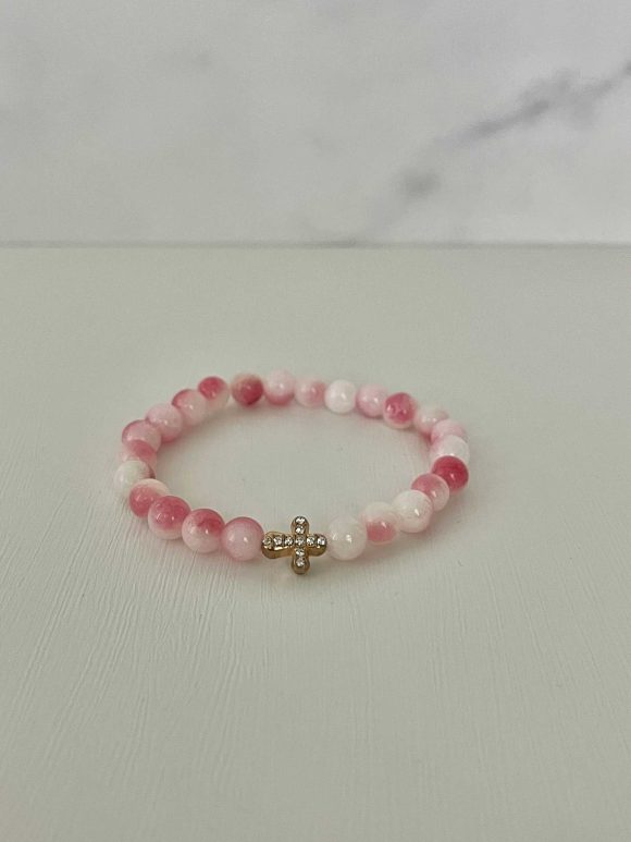 Pink white marble cross bracelet, handmade Christian jewelry, features a gold cross charm, perfect faith-inspired gift or daily accessory.