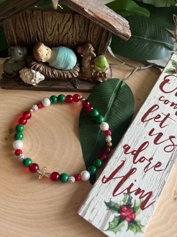 Christmas Cross Bracelet with festive design, faith-inspired holiday jewelry, perfect Christian gift for women during the Christmas season.