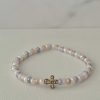 Gold Cross Shell Bead Bracelet with handcrafted design, faith-inspired Christian jewelry for women, perfect for everyday wear.