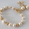 Cotton pearls set in gold tones - Image 2
