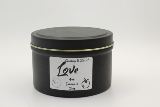 Black metal tin closed with with label “Love”