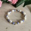Floral pearl cross bracelet for Christian women – handmade faith jewelry with freshwater pearls and flower beads, religious gift idea