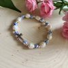 Handmade silver cross bracelet with floral beads and freshwater pearls – Christian jewelry gift for women