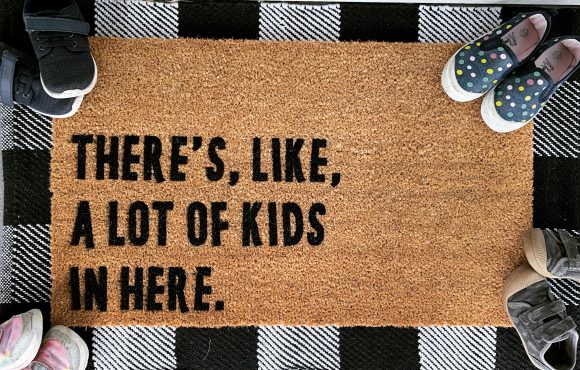 THERE'S, LIKE, A LOT OF KIDS IN HERE handmade doormat