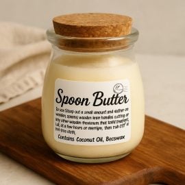 All-natural spoon butter wood conditioner in a jar, used to restore and protect wooden spoons, cutting boards, utensils, and butcher blocks. Handmade with food-safe organic ingredients for deep conditioning and natural shine. Perfect for kitchen wood care, non-toxic and eco-friendly. Ideal for preserving wood tools, preventing cracks, and enhancing grain. A must-have for wooden kitchenware maintenance and polish.